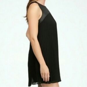 Bebe black sleeveless pleated mini dress